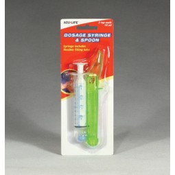 Dosage Syringe And Spoon